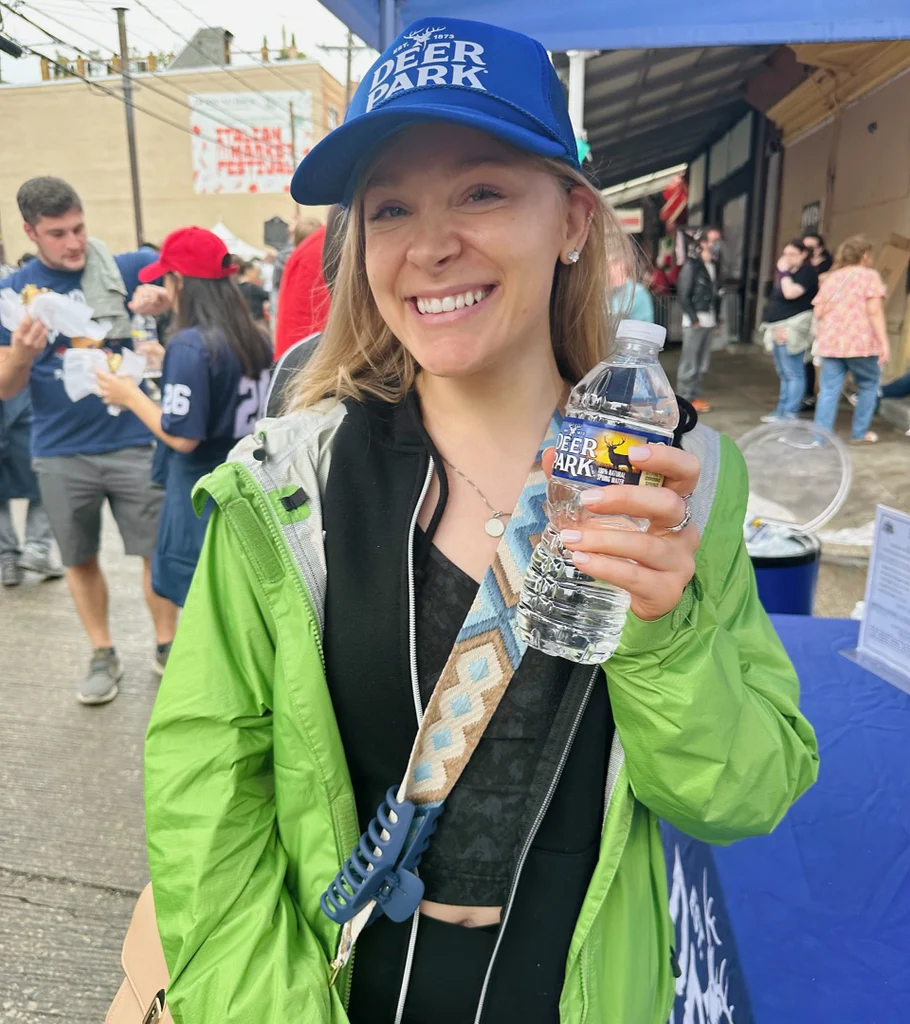 Deer Park Philly Cheesesteak Girl with Bottle